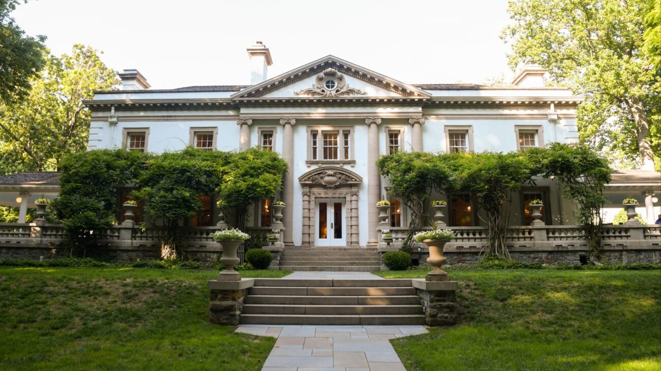 Historic Liriodendron Mansion framed by trees in Bel Air, Maryland