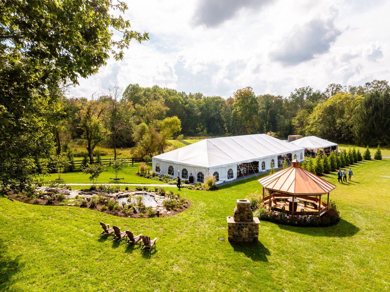 Reception tent and rustic grounds at Good Feelings Farm